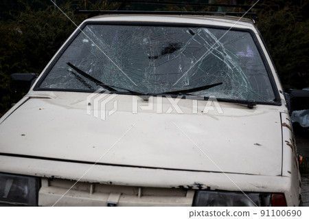 Irpin, Kyev region Ukraine - 09.04.2022: Shot cars. On the streets of Irpin. Cities of Ukraine after the Russian occupation. Irpin, Bucha, Hostomel. Irpin, Kyev region Ukraine - 09.04.2022: Shot cars. On the streets of Irpin. Cities of Ukraine after the Russian occupation. Irpin, Bucha, Hostomel. 91100690