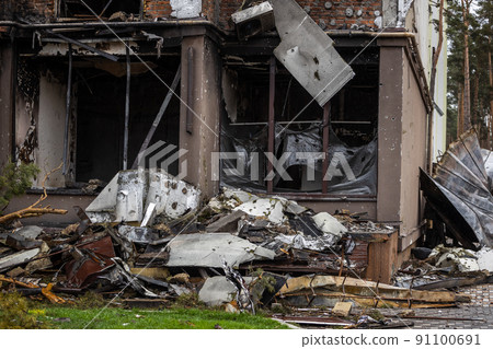 Irpin, Kyev region Ukraine - 09.04.2022: Cities of Ukraine after the Russian occupation. Destroyed buildings on the streets of Irpen. Broken, shelled windows. Buildings after being hit by missiles. Irpin, Kyev region Ukraine - 09.04.2022: Cities of Ukraine after the Russian occupation. Destroyed buildings on the streets of Irpen. Broken, shelled windows. Buildings after being hit by missiles. 91100691