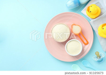 Concept of baby food with powdered milk 91105673