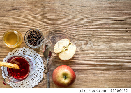 Mulled wine with spices on wooden background Mulled wine with spices on wooden background 91106482