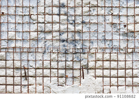 Vintage background of construction rusty stucco mesh and gray concrete. 91108682