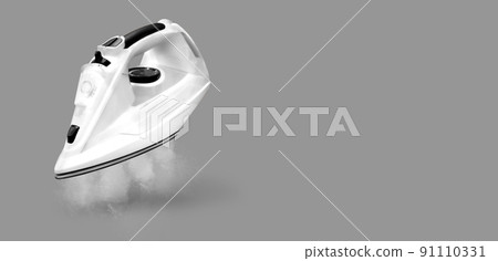 modern iron on grey background modern iron on grey background 91110331
