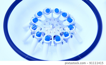 Blood in centrifuge. Platelet-Rich plasma preparation. Tubes with blood in Centrifuge. Blue tonned image Blood in centrifuge. Platelet-Rich plasma preparation. Tubes with blood in Centrifuge. Blue tonned image 91111415