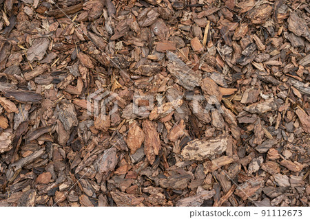 Pine Bark Mulch. A pile of wood chips to be used as landscaping mulch 91112673
