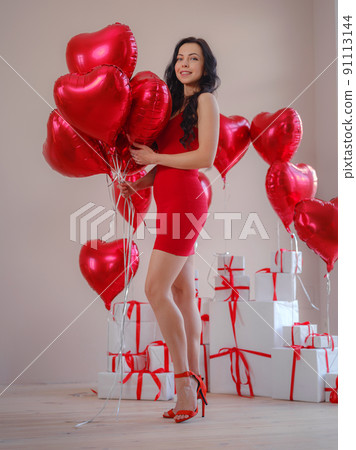 Beautiful happy young woman, celebrating Valentine's Day Beautiful happy young woman, celebrating Valentine's Day 91113144