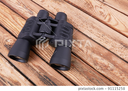Binocular on wood Binocular on wood 91115258