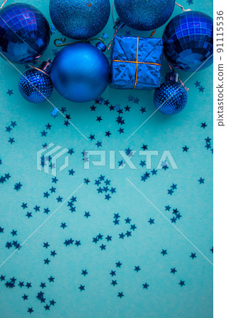 Christmas holidays composition, top view blue-aquamarine Christmas decorations on a green-blue Christmas holidays composition, top view blue-aquamarine Christmas decorations on a green-blue 91115536