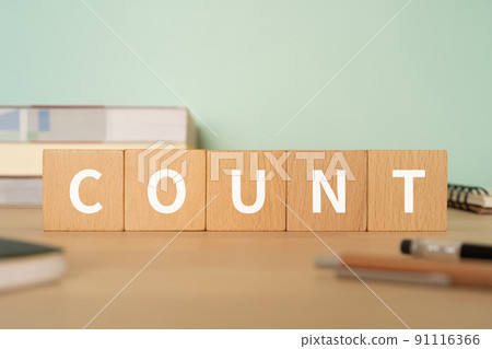 計數的圖像 | 帶有標有“COUNT”的塊的桌子 計數的圖像 | 帶有標有“COUNT”的塊的桌子 91116366