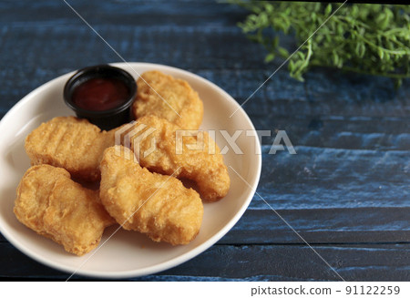 Fast food nuggets on the table 91122259