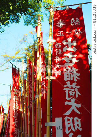 Scenery with a red nobori of Nishiarai Daishi (Adachi-ku, Tokyo) Scenery with a red nobori of Nishiarai Daishi (Adachi-ku, Tokyo) 91123339