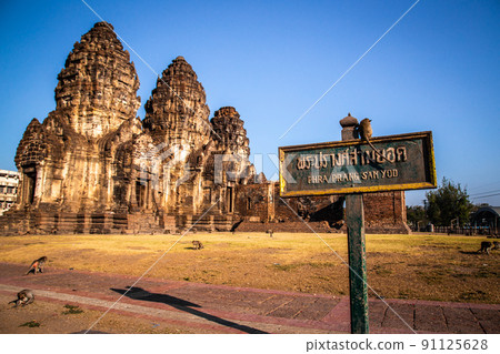 Pra Prang Sam Yod or Phra Prang Sam Yot ruin temple with monkeys, in Lopburi, Thailand 91125628