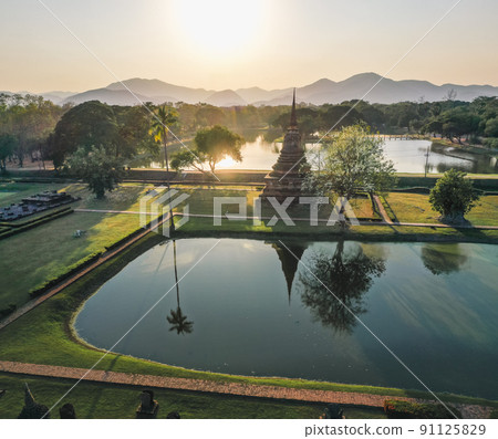 Aerial view of Wat Mahathat buddha and temple in Sukhothai Historical Park 91125829