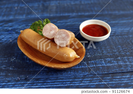 Frankfurt-like sausage with traditional German pork stuffed with parsley on the table Frankfurt-like sausage with traditional German pork stuffed with parsley on the table 91126674