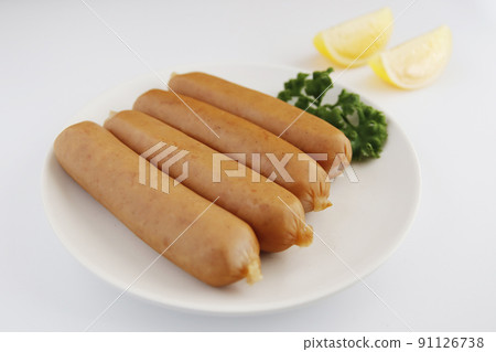 Frankfurt-like sausage with traditional German pork stuffed with parsley on the table Frankfurt-like sausage with traditional German pork stuffed with parsley on the table 91126738