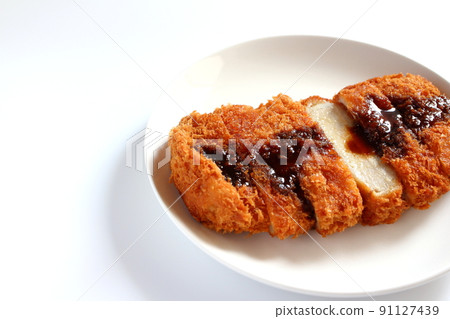 Tonkatsu where you can see the cross section with the sauce 91127439
