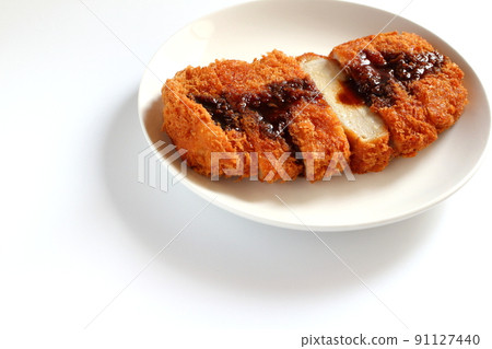 Tonkatsu where you can see the cross section with the sauce 91127440
