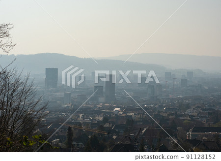 Zurich, Switzerland - March 26th 2022: View from Zuerichberg over the city with skyscrapers 91128152