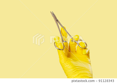 Woman's hand with medical tool in the white background 91128343