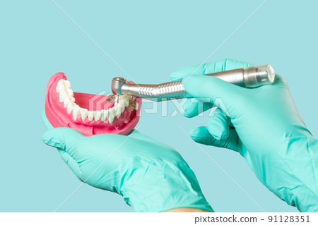 Dental instruments for teeth dental care on blue background 91128351