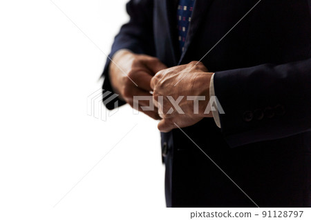 Middle man wearing a suit 91128797