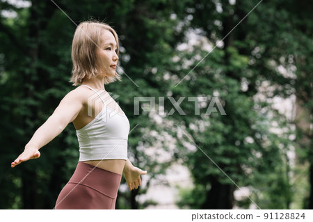 A young lad yoga outdoors A young lad yoga outdoors 91128824