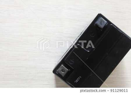 Old motorcycle battery removed 91129011