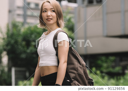 Healthy blonde Japanese woman in her 20s, Y2K fashion Healthy blonde Japanese woman in her 20s, Y2K fashion 91129856