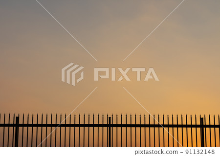 Sunset and fence Sunset and fence 91132148