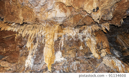 Cave with Stalactites and stalagmites - Tuscany Italy Europe 91134608