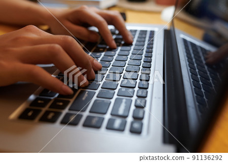 Teenage Girl Coding on Laptop 91136292