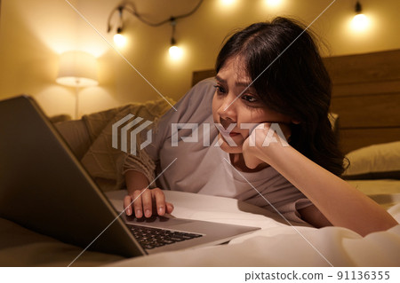 Girl Reading Posts on Social Media Girl Reading Posts on Social Media 91136355