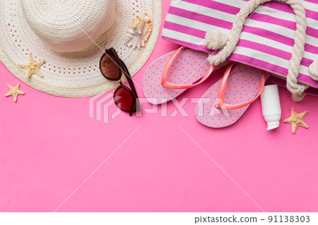 Summer vacation concept flat lay. straw hat beach accessories and towel top view. Space for text. travel concept Summer vacation concept flat lay. straw hat beach accessories and towel top view. Space for text. travel concept 91138303