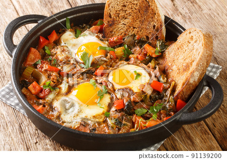 Acquacotta is a delicious tuscan soup originally from Maremma close up in the pot. Horizontal 91139200