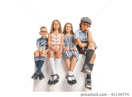 Group of cheerful kids in retro style summer outfit isolated on white background. Concept of art, friendship, hope, youth, fashion 91139774