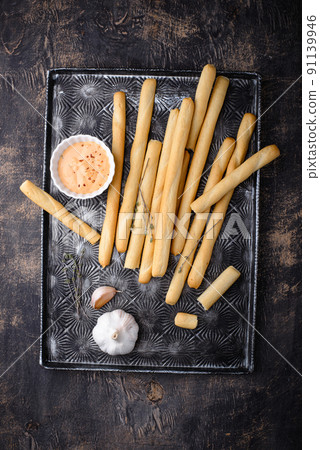 Italian grissini, traditional appetizer breadstick 91139946