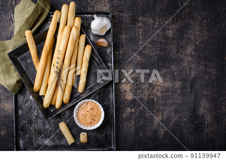 Italian grissini, traditional appetizer breadstick 91139947