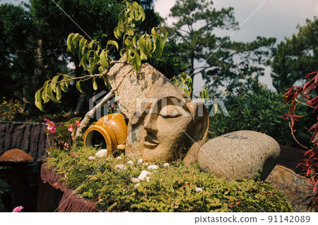 Botanical garden inside Truc Lam Zen Monastery which is a popular tourist attraction in Da lat, Vietnam Botanical garden inside Truc Lam Zen Monastery which is a popular tourist attraction in Da lat, Vietnam 91142089