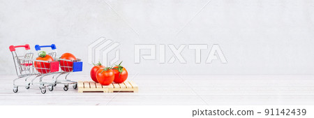 tomatoes in a cart and on a pallet tomatoes in a cart and on a pallet 91142439
