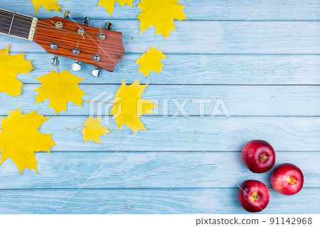 Guitar and autumn leaves.. Guitar and autumn leaves.. 91142968