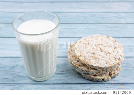 glass of milk with grain crispbreads glass of milk with grain crispbreads 91142969