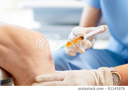 doctor make injection in knee doctor make injection in knee 91145876