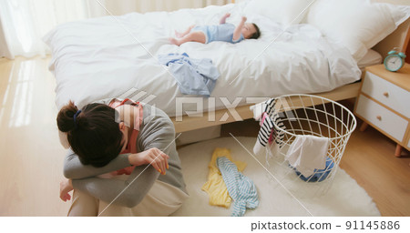 mother with her baby mother with her baby 91145886