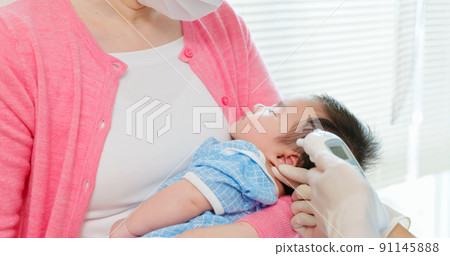 asian doctor examine baby fever asian doctor examine baby fever 91145888