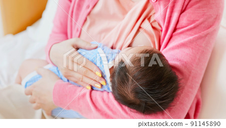 asian mother breastfeeding baby asian mother breastfeeding baby 91145890