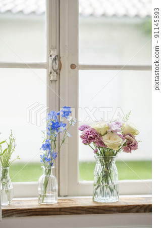 Vase placed on the windowsill Vase placed on the windowsill 91145893