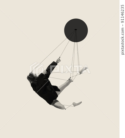 Contemporary art collage with young woman, ballerina attached to strings and falling down isolated on grey background. Line art design Contemporary art collage with young woman, ballerina attached to strings and falling down isolated on grey background. Line art design 91146235