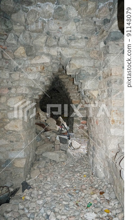 Stone castle, near the walls and inside. Stone castle, near the walls and inside. 91148079