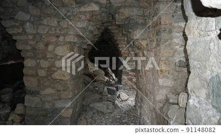 Stone castle, near the walls and inside. Stone castle, near the walls and inside. 91148082