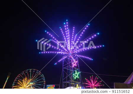 The amusement park in Thai traditional night temple fair in Bangkok City, Thailand. Local market street food festival. 91151652