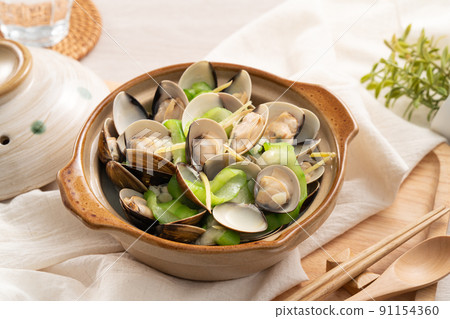Fried Loofah gourd with Clam, Taiwanese homemade local food. 91154360